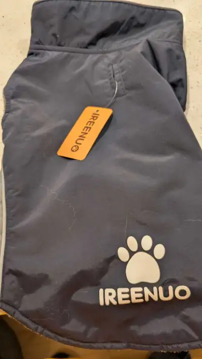 New Ireenuo dog raincoat for sale. Perfect for the spring or the fall. Size small. 100% waterproof....