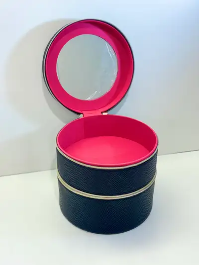 Clean and in like new condition . The mirror has the protective plastic on it , just tiny mark under...