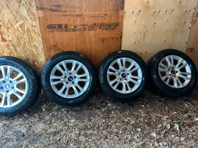 Set of 4 Bridgestone Dueller H/L summer tires / rims in very good condition. 275/55 R20 Came off of...