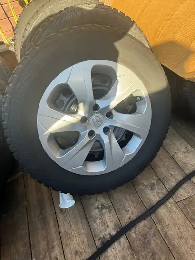 Almost new uniroyal winter tires with rav4 rims and cover Original from toyota dealer
