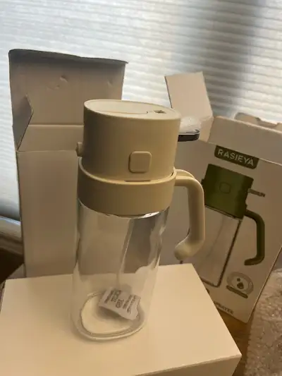 Oil dispenser for kitchen/BBQ Brand new in box, never used. Only one left. White color top and glass...