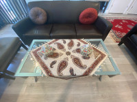 Stylish glass coffee table with bottom mirror for sale!