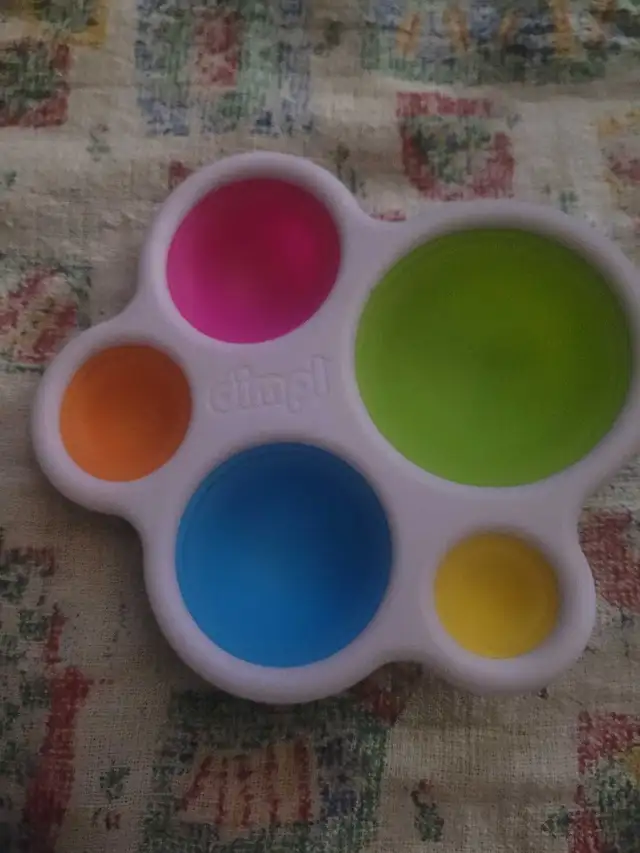 Fat Brain Toys Original Dimpl sensory toy.