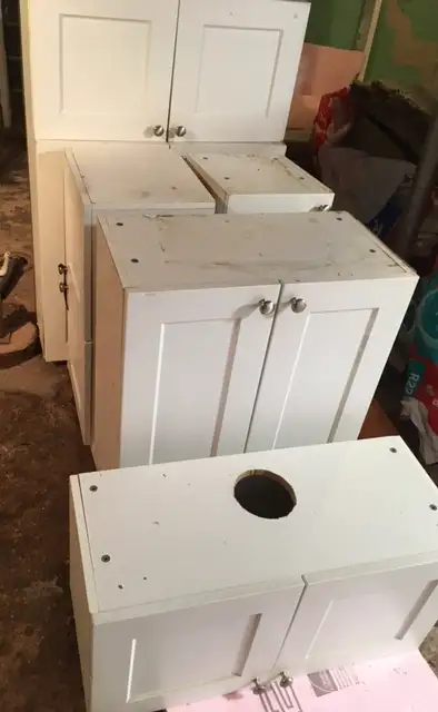 8 piece cabinets, some water damage,doors good-$220, View more