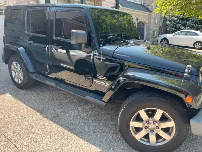 2015 Jeep Wrangler unlimited Sahara in very good condition. Engine transmission solid clutch replace...