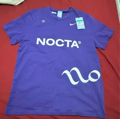 NOCTA nike shirt, View more