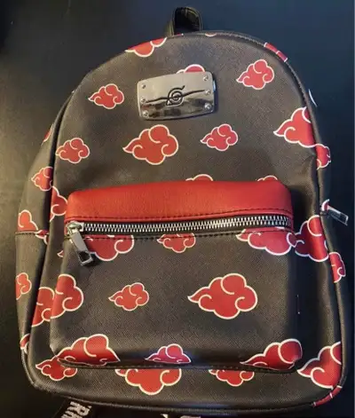 Itachi Uchiha mini backpack! With a cloud pattern and the phrase 'Train Like A Ninja' on the straps....