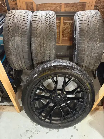 Four 285/45R21 Continental Wintercontact Tires on Gloss Black Rims 21x9.5 used four seasons includes...