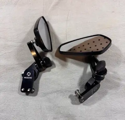 New. Arrow style folding mirrors from NiceCNC. They have been mounted but never ridden with. $75