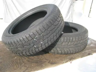 2 USED STUDED WINTER TIRES IN GOOD SHAPE. TREAD DEPTH IS 7mm. GOOD AGRESIVE TREAD. NO PLUGS IN TIRES...