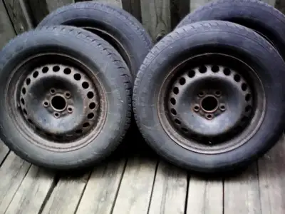 4 snow tires on rims. off a 2016 ford focus. will fit other fords with 5x108mm bolt patern tires are...