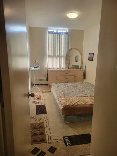 A furnished seperate room in 2 bed apt Available for only one person, other room occupied by Male. A...