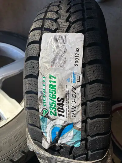 4 tires on rims, plus one extra tire. Used for 1 winter. Comes on Volvo rims. Sold the car, need the...