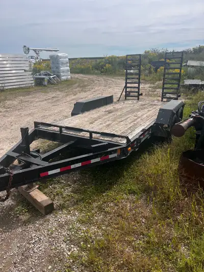 Tandem axle - 6000 pounds each 14 foot length Used to haul skid steer between farms. Ownership in ha...