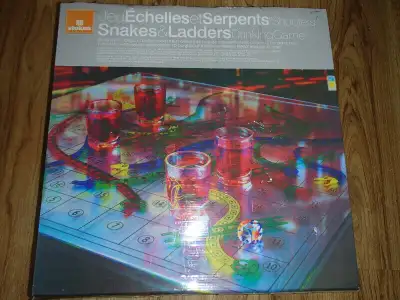 Snakes And Ladders Game for sale Like new condition, nice painted glass measures 16.5x16.5 inches, 4...