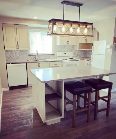 Modern/updated apartment (back portion of a duplex) for rent in the village of Winchester. Open conc...