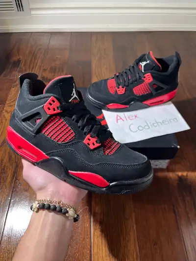 Selling used pair of popular Jordan 4 Red Thunders. Comes with the original box, paper, and Jumpman...