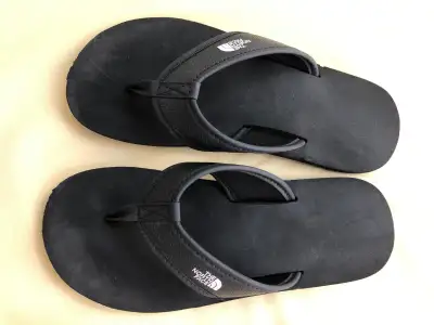 Kids North Face Flip Flops. Cushioned foot bed has anatomical arch support. Rubber sole. Sole measur...