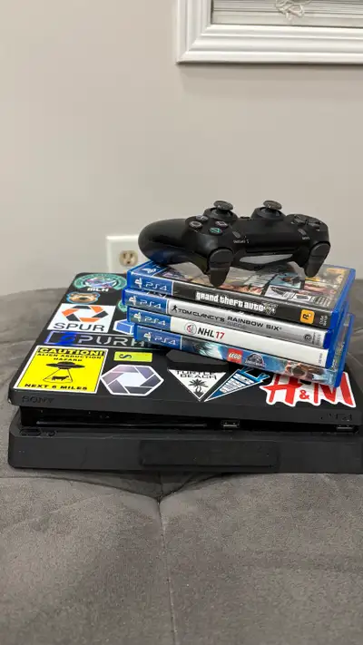 500GB PS4 Slim For Sale With 4 Games, View more