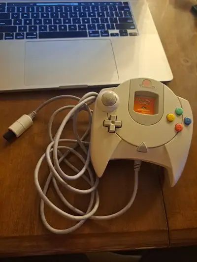 Sega Dreamcast Controller with Memory card. Have been cleaned and are both in good condition Asking...