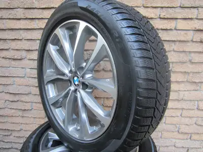 Excellent condition,low mileage no damages on the set ,over 80% tread on tires. Genuine BMW X3 X4 wi...