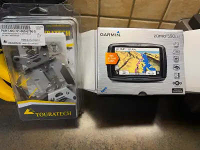 NEW in box (unused), Full GPS with lifetime maps and Touratech locking mount. This one is full weath...