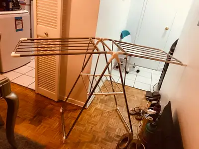 Clothes drying rack (NEW CONDITION) $20, View more
