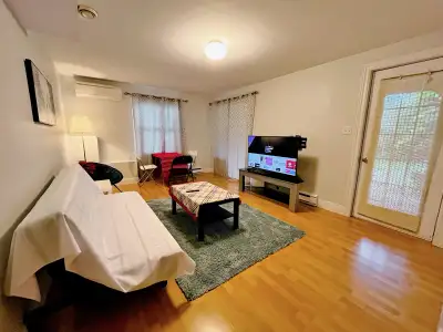 Available Immediately Spacious basement room with private living room and bathroom, walk-out entranc...