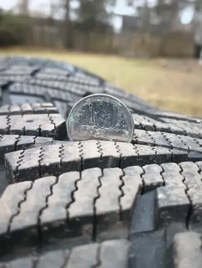 Set of 4 IRONMAN POLARTRAX winter tires. 215/65/R16. Only used for 1.5 winters. Lots of tread left.