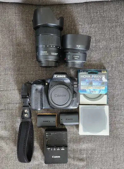 I'm selling my Canon EOS 80D camera, which comes with a versatile 18-135mm lens, a 50mm lens for stu...