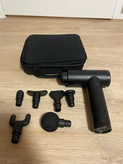 Pistolet masseur neuf avec 6 embouts différents et 30 niveaux de puissance