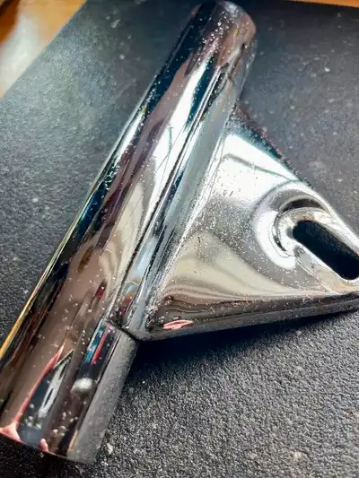 Chrome headlight brackets for Norton Commando. Chrome finish is pitted with some rust apparent. Brac...