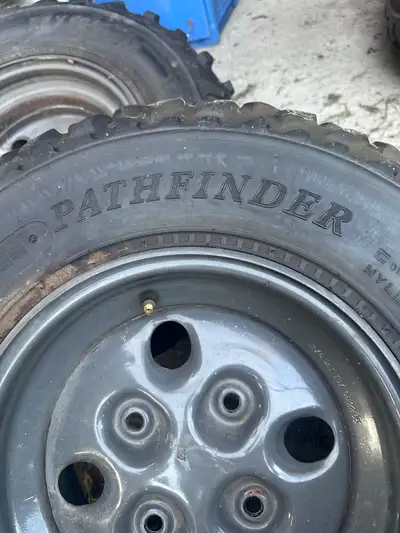 Set of 4 Kenda Pathfinder K530 tires 2 front size 25 X 8 X12 2 rear size 25 X 10 X 12 All are in gre...