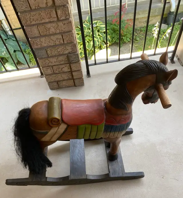 Antique Hand Carved Rocking Horse.34”x34”x15”.