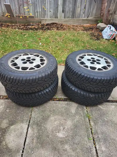 Set of 4, 15 inch wheels with winter tires - asking $150 OBO. Well maintained. Previously on Honda C...