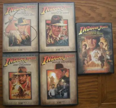 First 3 dvd movies + bonus material box set + 4th movie in separate case. All for one low price. I a...