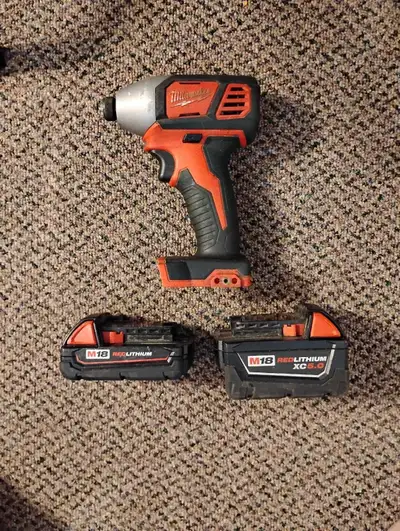 Milwaukee impact driver w M18 Batteries, View more
