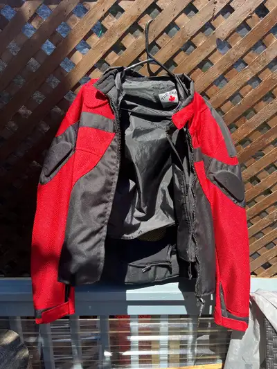 This is a Kevlar jacket with padded shoulders elbows fore arms back and kidneys. It also has a zip o...
