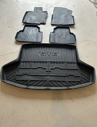 Selling this set of durable, all weather floor mats and a matching cargo liner. Designed to handle d...