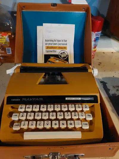 Typewriter,very old in new condition plus carry case