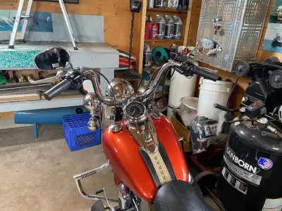2009 Soft Tail. New custom paint 2 years ago (Burnt Orange with metallic specks) LED headlight and P...