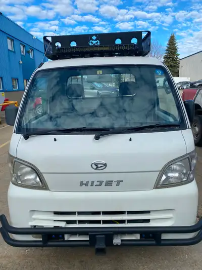 2010 Daihatsu Hi Jet mini truck Lifted c/w DOT tires Custom winch bumper front and back Custom roof...