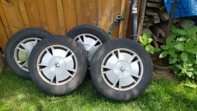 Set of 4 2010 Honda Civic rims and tires. Text only please. No emails or calls