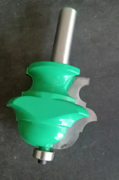 1/2" shank carbide router bit. Multi profile, so adjusting the depth and fence can yield multiple ed...
