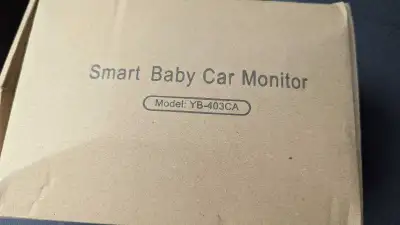 Smart Baby Car Monitor, model YB-403CA. This device is a baby car monitor that allows a driver to se...