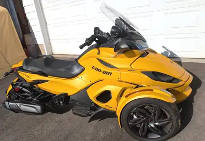 This 2013 Spyder ST-S - has:" - Sport-inspired styling, with touring-ready Design. -The three-wheele...