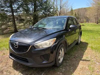 Mazda CX-5 GX 2014 manuelle. 315 000 km. Avec pneus été et hiver sur jantes. Voiture très fiable. To...