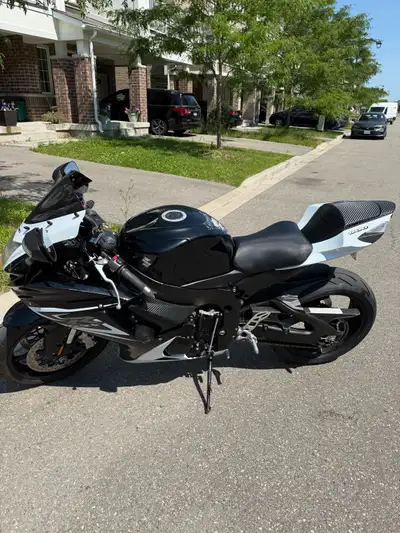 Hi I am selling my Gsxr 600. Its 2014 black and white color combination. Heated grips Custom seat -...