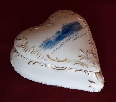 A very old covered trinket dish showing the Mt. Allison buildings in Sackville , in a blue transfer...