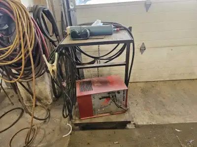 220v welder and cart, View more